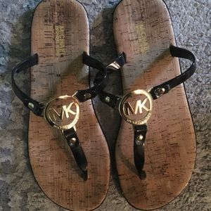 Michael Kors flip flops size 8. Great condition!